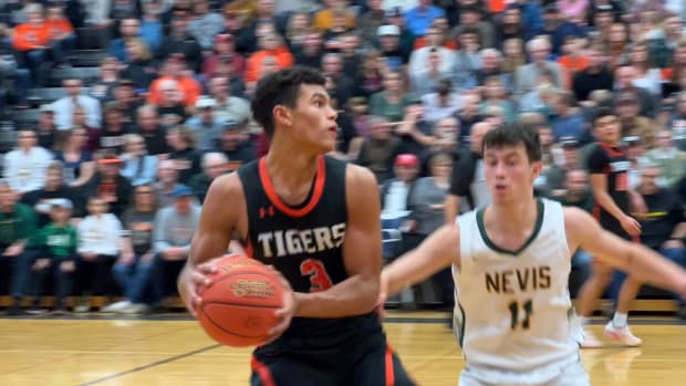 Isaac Asuma looks to pass